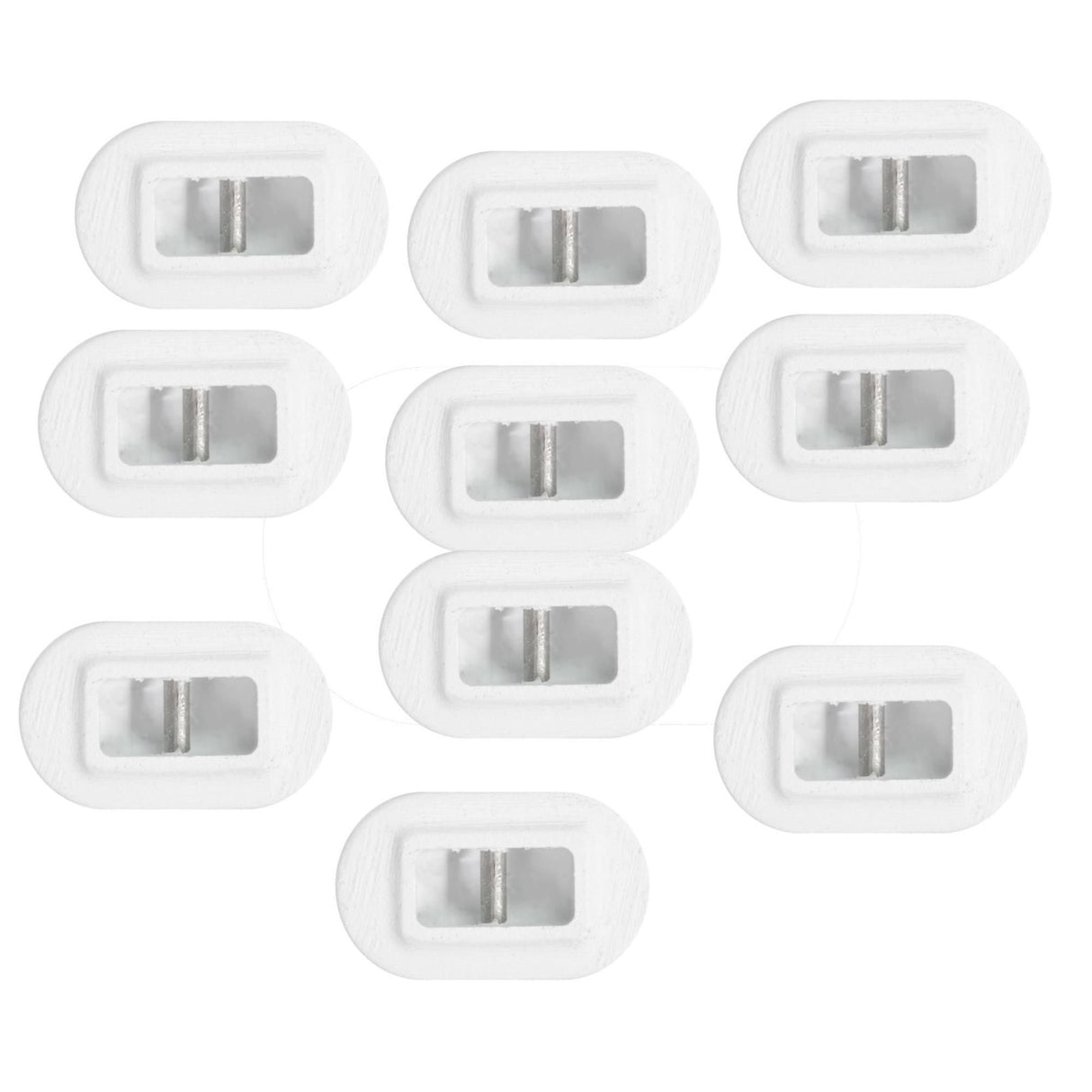 Futures Leash Plug Set, acht weiße Kunststoffstecker mit Metallteilen, Draufsicht auf komplettes Set