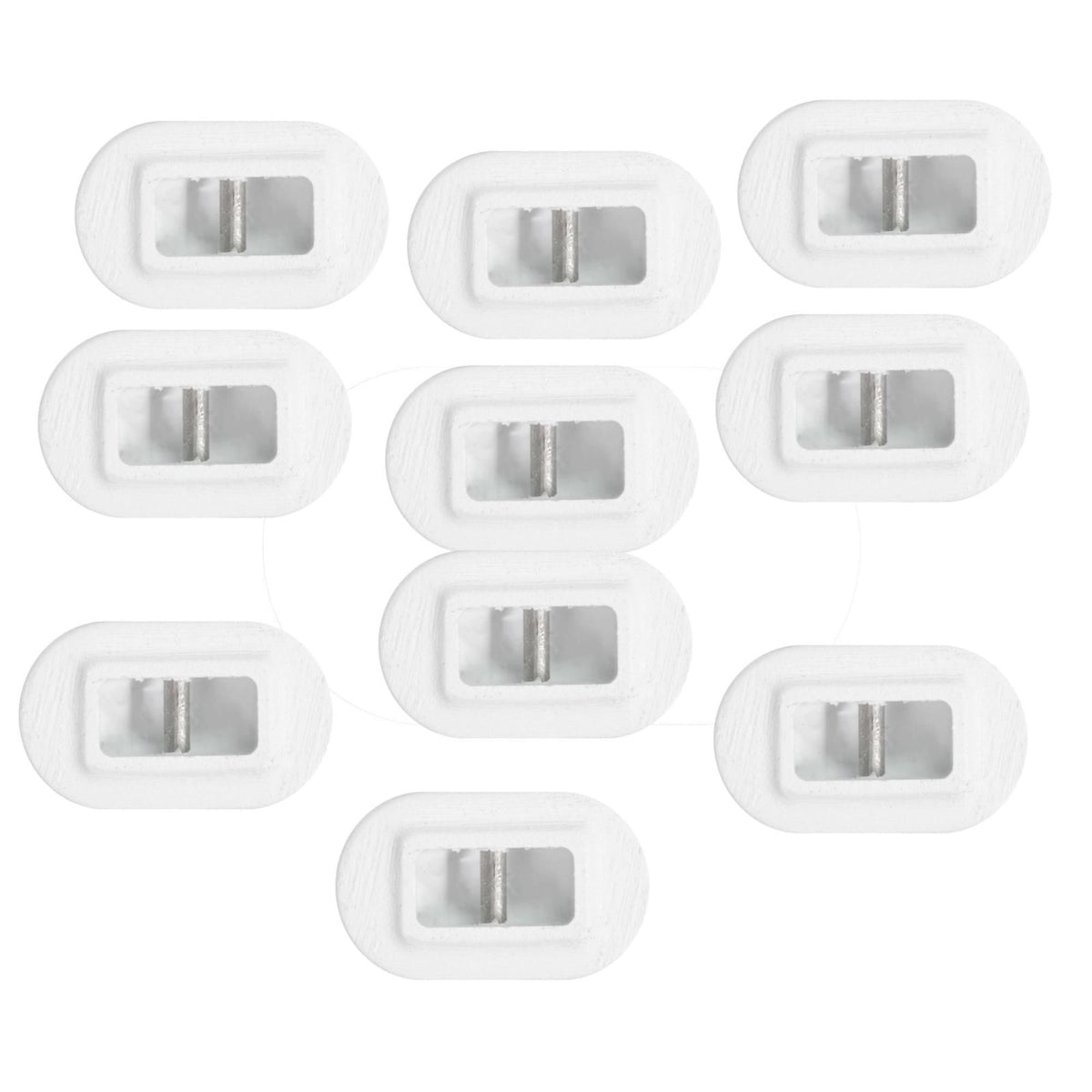 Futures Leash Plug Set, acht weiße Kunststoffstecker mit Metallteilen, Draufsicht auf komplettes Set