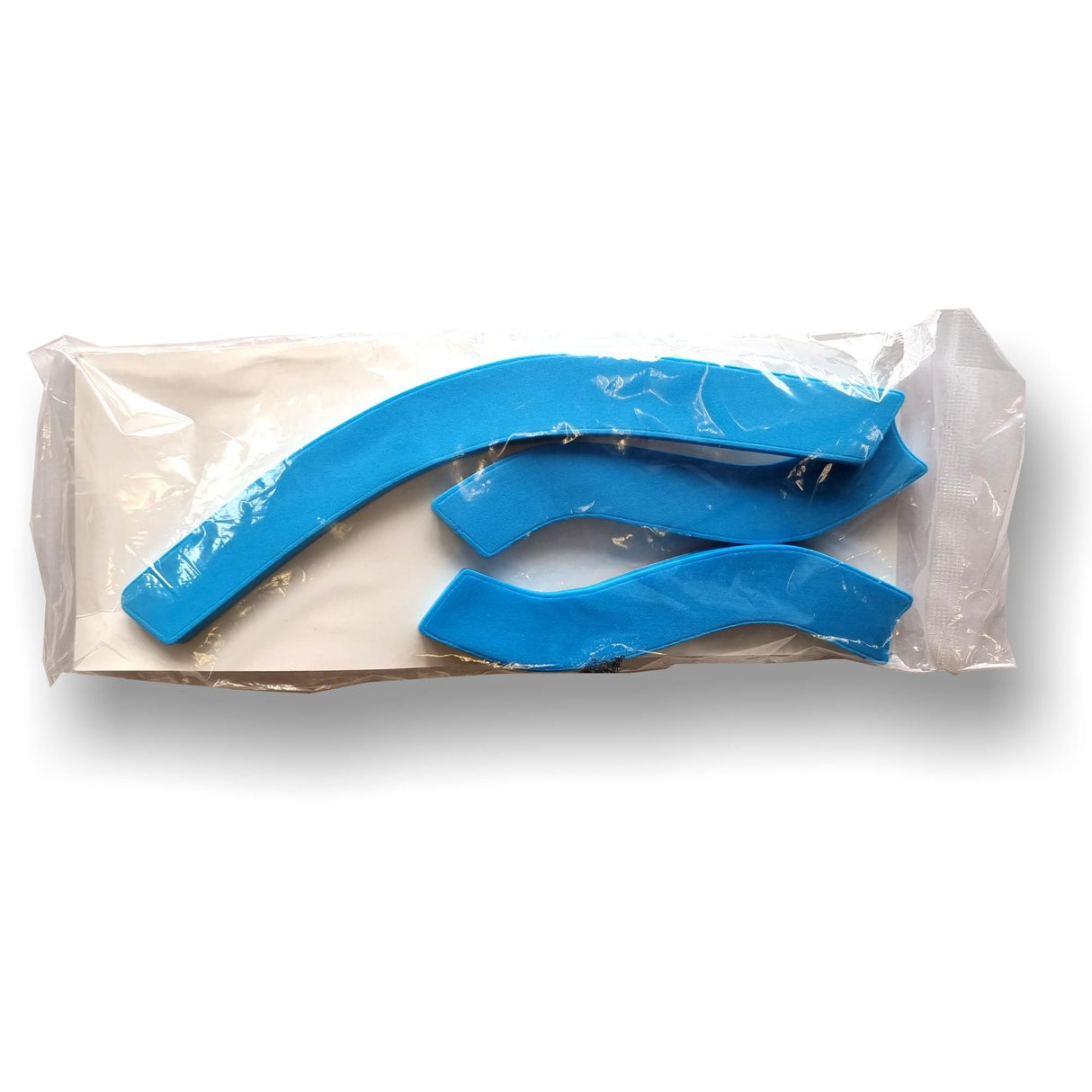 Simba Surf Helm Halo Fit Pads 7mm, blaue Polsterung, Schaumstoff, Draufsicht verpackt