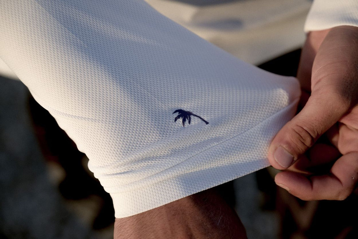 ION Wetshirt LS men 2025, weiß, Langarm, atmungsaktives Material, Detail der Ärmelbündchen mit ION Logo