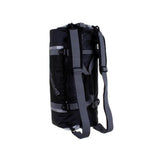OverBoard Duffel Bag Pro schwarze wasserdichte Reisetasche mit grauem Rucksackträger und Reflektorstreifen, Ansicht von hinten