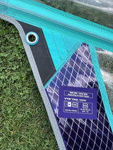 Duotone X_Pace 7.3 2026 Kiteboard Türkis mit schwarzem Pad und violettem Strömungsmuster Draufsicht