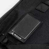ROAM Coffin Wheelie Boardbag schwarz mit Rollenkofferfunktion, Detail des Markenlogos und Tragegriff