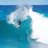 Futures Thruster Fin Set JJ Florence Alpha in Aktion beim Surfen auf türkisblauer Welle