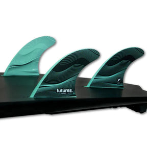 Futures F4 Legacy Neutral Thruster Set türkis und schwarz mit strukturierter Oberfläche, Seitenansicht auf schwarzer Basis