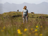 ION Pants HD Cotton 2026 grau, Baumwolle, Wanderhose, Frontalansicht auf Person in Berglandschaft