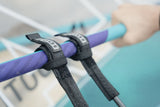 ION Windsurf Harness Line Fix Pro 2026 mit schwarzen Befestigungsgurten auf violettem Boom, Detailansicht
