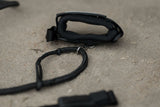 ION Wing Leash Core Dyneema Wrist 2024, schwarze Handgelenkschlaufe aus Dyneema-Material mit Befestigungspunkt, Draufsicht