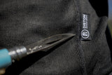 ION Rashguard LS Surf Shield SS2026 in Schwarz, langarm Funktionsshirt mit Struktur-Gewebe und ION-Logo, Detailaufnahme