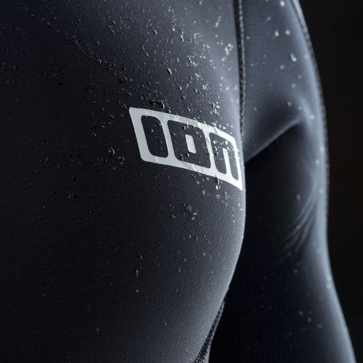 ION Collision Vest Element Side Zip 2026 in Schwarz, Seitenansicht mit Reißverschluss und ION-Logo, wasserabweisendes Material