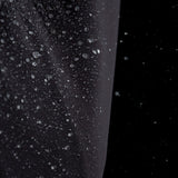 ION Collision Vest Element Side Zip 2026 schwarz mit Wassertropfen, Detailaufnahme der wasserabweisenden Oberfläche