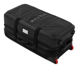 Mystic Venture Check-in Bag 2027, schwarzer Reisekoffer mit roten Rollen, Tragegriffen und Namensschild, Draufsicht