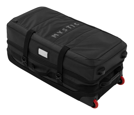 Mystic Venture Check-in Bag 2027, schwarzer Reisekoffer mit roten Rollen, Tragegriffen und Namensschild, Draufsicht